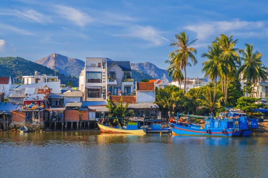Traditional fishing boats near the colorful fishing port in Nha Trang, Vietnam.