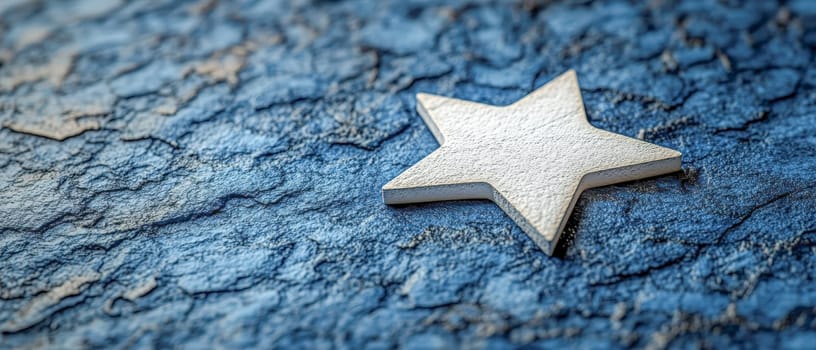 Presidents' Day. A close-up of a white star lying on a rugged blue textured surface, perfect for patriotic and historic themes
