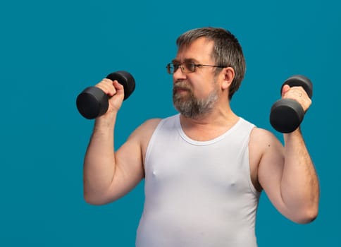 An elderly man is exercising by lifting dumbbells to enhance his strength. He is focused on his workout while wearing a sleeveless shirt. The bright background adds energy to the activity.