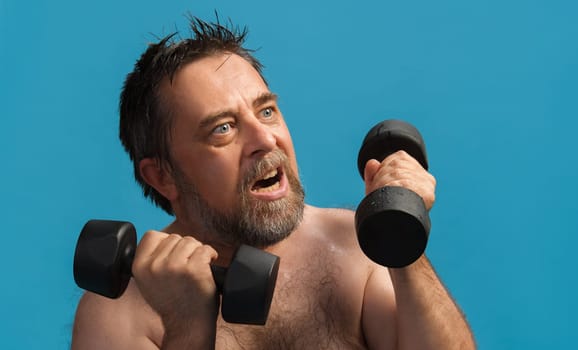 An elderly man performs strength training with dumbbells, focusing intensely on his workout. He is in a brightly lit environment, emphasizing vitality and physical fitness.