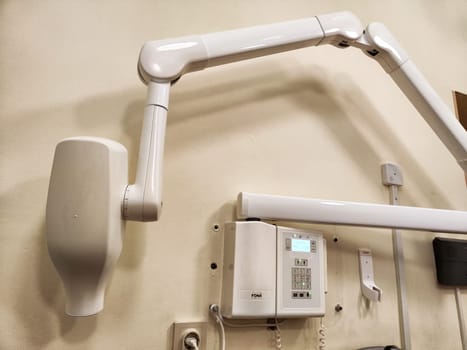 Kirov, Russia - November 28, 2024: An advanced X-ray machine is set up in a hospital room, prepared for patient diagnostics and ongoing treatment assessments.