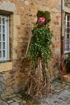 A figure of a man from ivy in a garden, landscape design in France