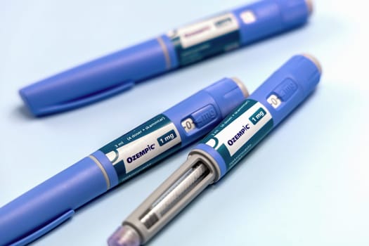 Ozempic Insulin injection pen or insulin cartridge pen for diabetics and weight loss. Medical equipment for diabetes parients. Copenhagen, Denmark - December 18, 2024