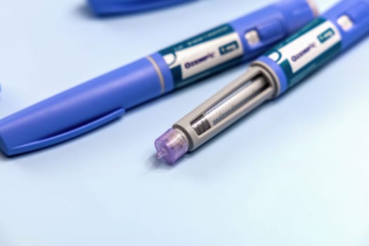 Ozempic Insulin injection pen or insulin cartridge pen for diabetics and weight loss. Medical equipment for diabetes parients. Copenhagen, Denmark - December 18, 2024