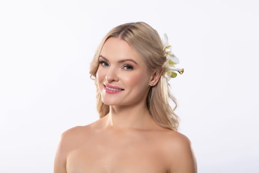 A stunning portrait featuring a woman with a flower in her hair, embodying natural beauty and elegance.