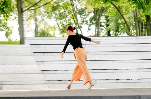 Teenage Girl Performs Contemporary Dance On Stage