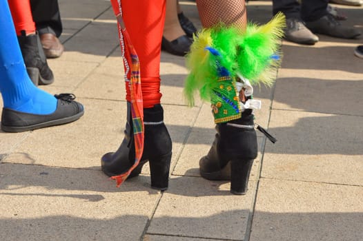 The female feet with heels for dancing