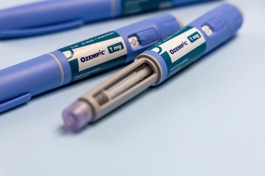 Ozempic Insulin injection pen or insulin cartridge pen for diabetics and weight loss. Medical equipment for diabetes parients. Copenhagen, Denmark - December 18, 2024