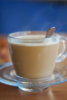A freshly brewed cup of aromatic coffee beautifully served on a delightful saucer