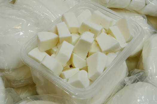 An appealing assortment of fresh white cheddar cheese cubes beautifully displayed for all to see