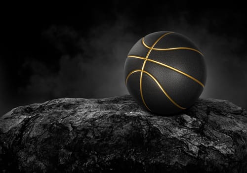 Basketball ball black on black stone, dark background with smoke
