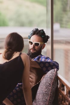 Close-up of young romantic couple is kissing and enjoying the company of each other at home