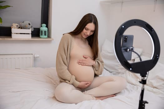A serene and peaceful pregnant woman gently caressing her belly, enveloped by cozy and inviting decor