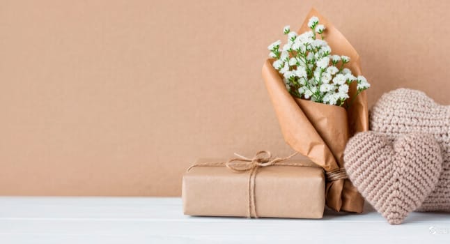 Bouquet of flowers and woven hearts. Valentine's day post image. Mocha Mousse Color Palette.Graphic resources for mother's day and valentine's day greetings.