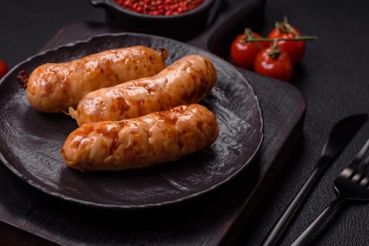 Grilled sausages with spices and herbs. Top view flat lay. With copy space