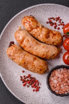 Grilled sausages with spices and herbs. Top view flat lay. With copy space