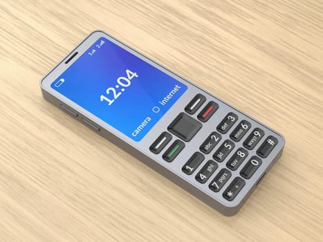Silver mobile phone on wooden desk