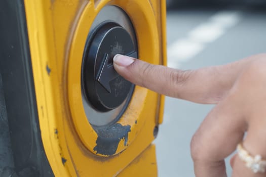 close up of crossing signal button .