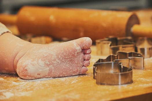 A family with children makes cookies. Close-up.