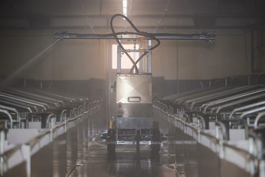 A robot washes on the modern pig farm in Denmark.