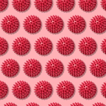 Round red ball with spikes, animal toy or massager. Repeating pattern
