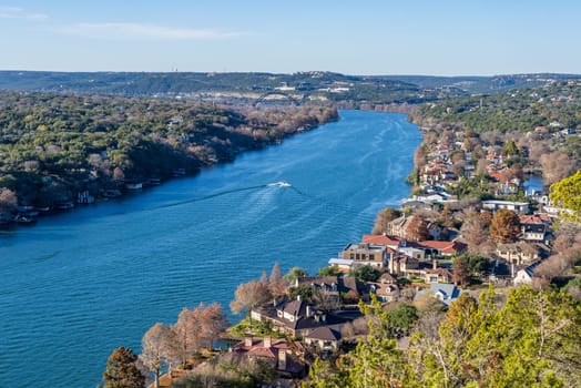 Expensive waterfront homes line the Colorado river near Austin Texas from Mount Bonnell