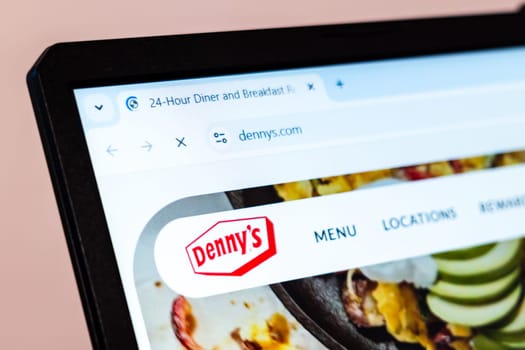 New York, USA - January 01, 2025: Dennys restaurant website displayed on computer screen showcasing menu options, locations, and dining services