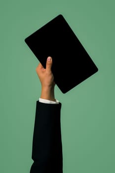 Hand holding tablet device on isolated background for start up tech company. Eco-friendly green business promoting electronic waste policy idea. Quaint