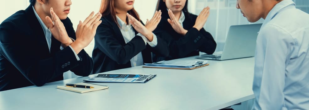 Candidate is rejected by job interviewer and human resources manager showing concept of unemployment, fired, disagreement and turning down the offer putting sadness on hiring person. Oratory failure.