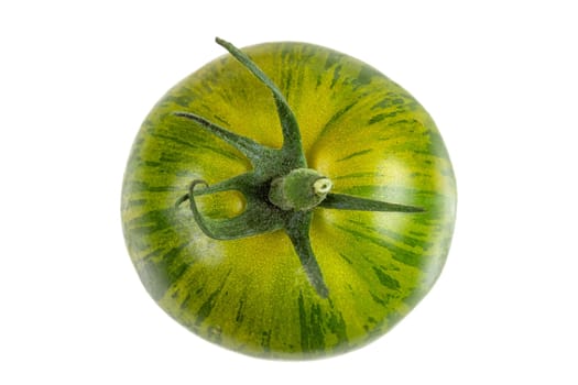 Whole fresh green zebra tomato close up and tomatoes in the background