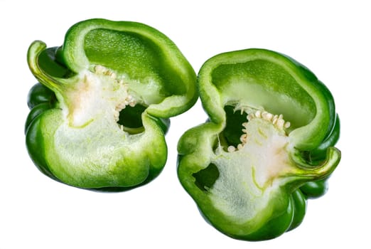 Set of fresh whole and sliced sweet greenpepper isolated on white background.