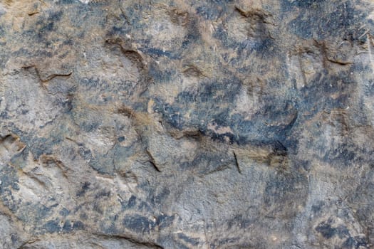 Detail of stone worked by years of exposure to water, Background or texture for further graphic work