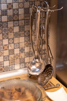 Close up shot of the metal kitchen utensils set