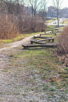 Wooden logs as a element of physical exercise equipment in the park