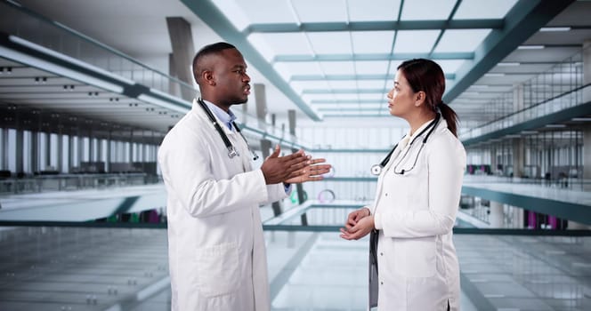 Happy Friendly Doctor Talking In Modern Hospital