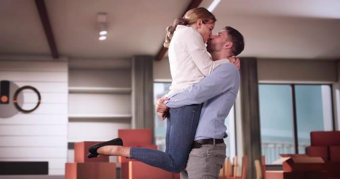 Happy Young Couple Moving Into New House