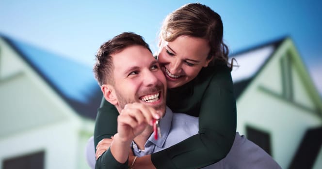 Happy Couple Holding Home Keys. Real Estate Mortgage