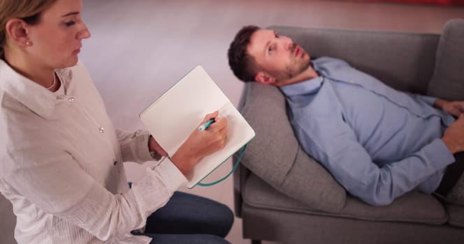 Psychotherapist With Businessman Patient Doing Mental Heath Therapy