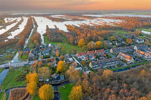 Aerial from Ankeveen at the Ankeveense Plassen in the Netherlands at sunset