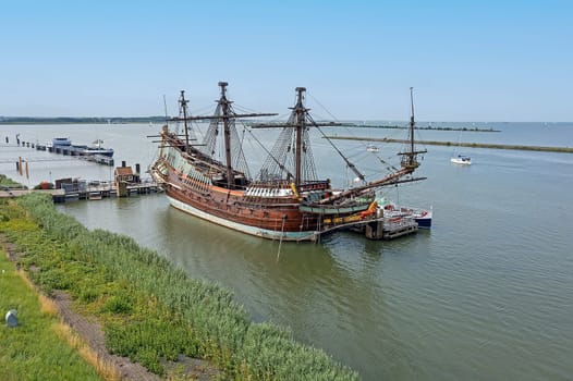Old traditional sailing ship in the harbor from Lelystad in the Netherlands