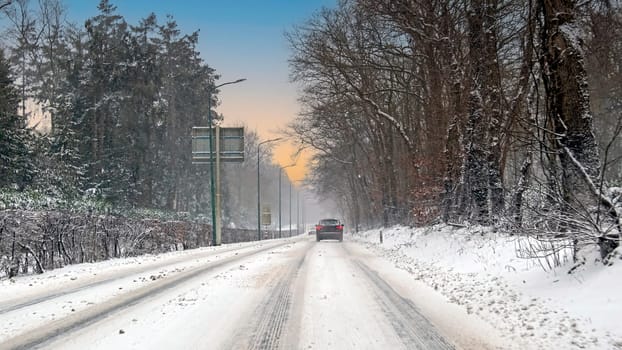 Driving in a snowstorm in the countryside from the Netherlands