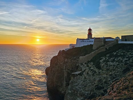 Lighthouse Cabo Vicente in Sagres Portugal at sunset