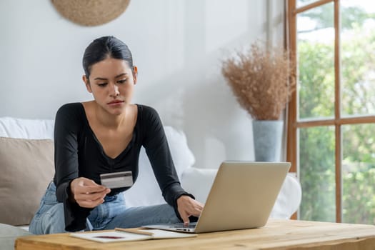 Stressed young woman has financial problems with credit card debt to pay uttermost show concept of bad personal money and mortgage pay management crisis.