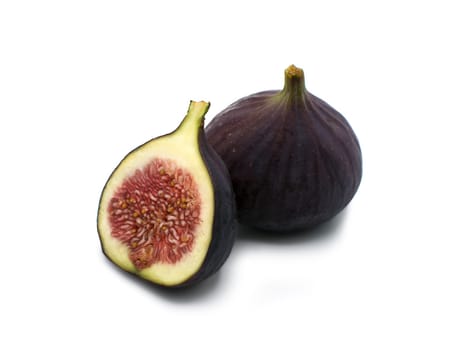 Fresh Fig fruit cut in half isolated