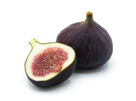 Fresh Fig fruit cut in half isolated