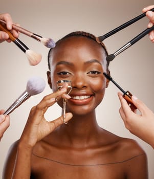 Tools, hands and portrait of black woman and makeup for getting ready, beauty product and glow. Happy, group and people with equipment for an African model, cosmetics and artist application in studio.