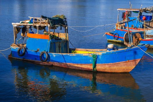 Local fishing harbor with boats in Nha Trang, Vietnam