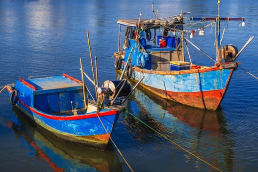 Local fishing harbor with boats in Nha Trang, Vietnam