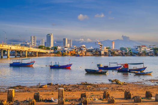 Vietnamese fishing boats at the pier or pier in Nha Trang, Asia.