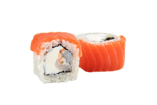 Sushi roll on a white background with Philadelphia cheese, tuna in sesame crumbs, sprinkled with soy sauce.